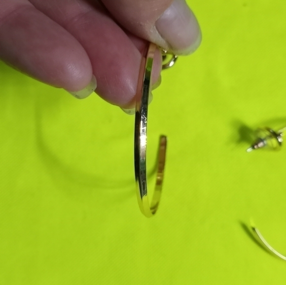 Goldtone large half hoop post earrings - Picture 3 of 5